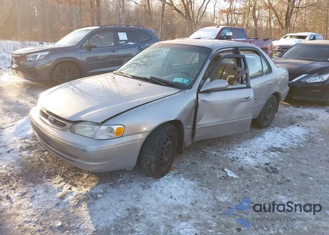 2002 Toyota Corolla Le from USA, damaged, VIN 2T1BR12E62C529586